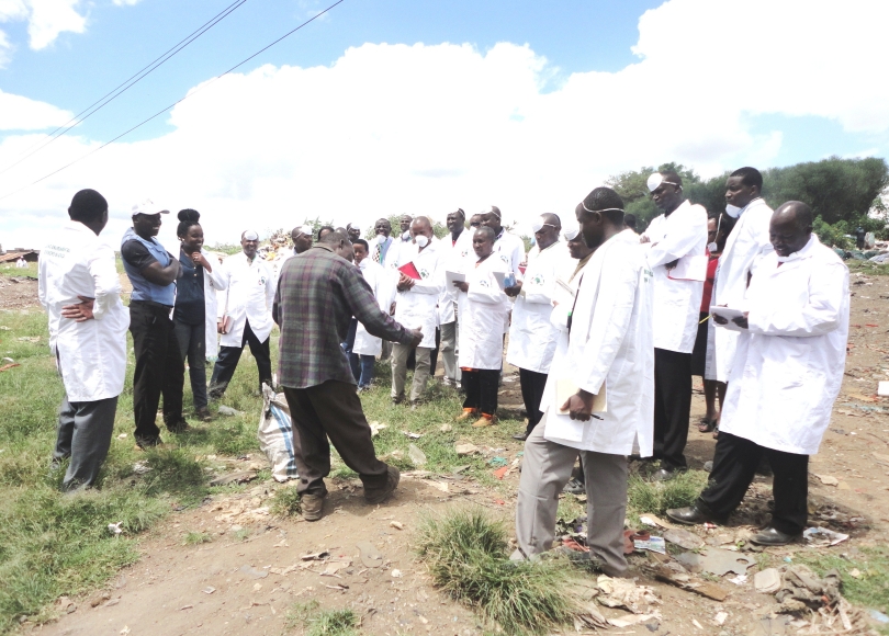 A Waste picker giving a brief on paper waste recovery activity at Dandora dumpsite