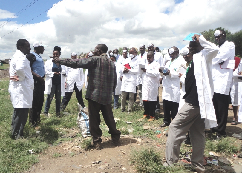 A waste picker with the ISWM Participants at Dandora Dumpsite